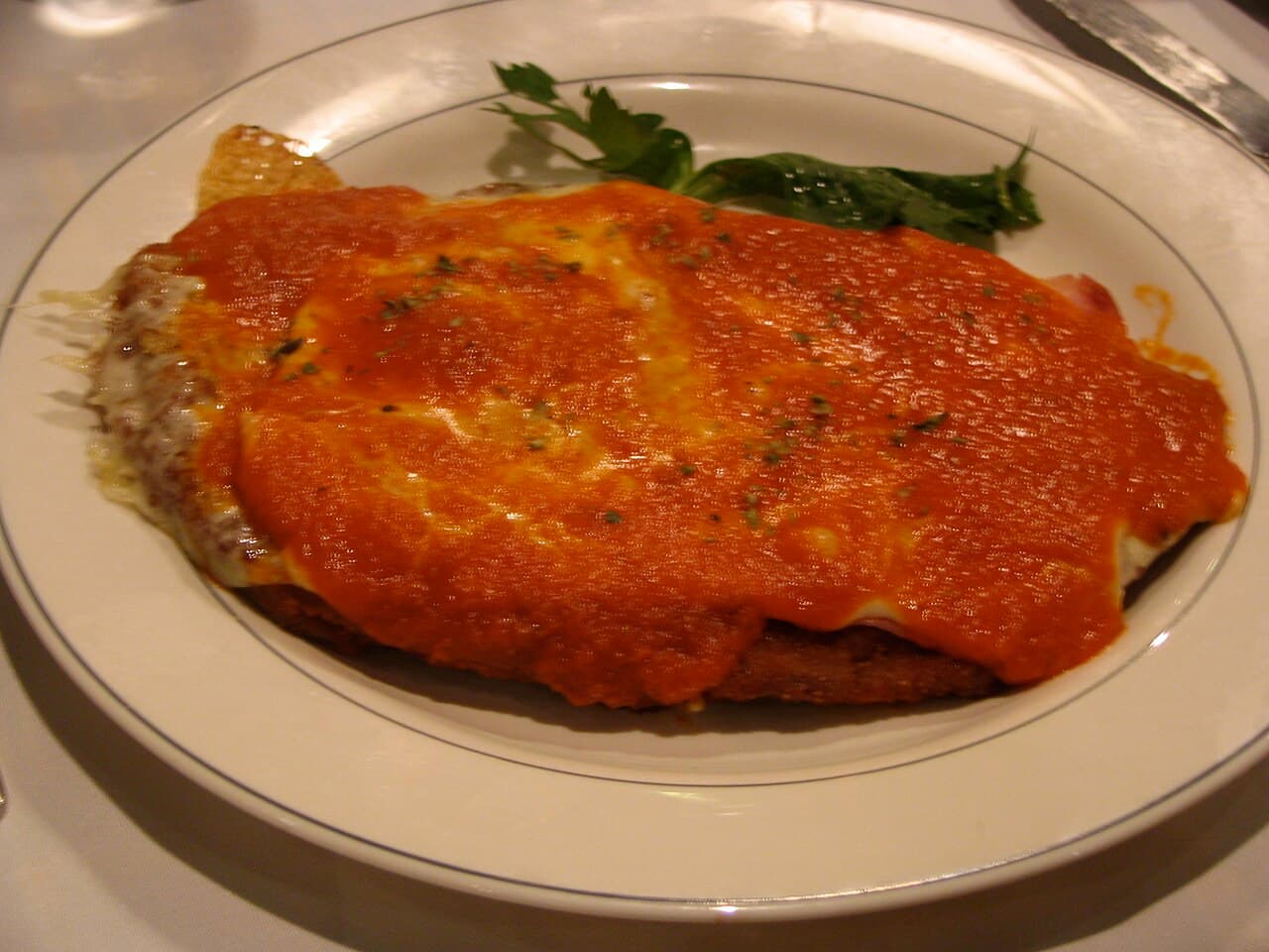 Milanesa napolitana con papas